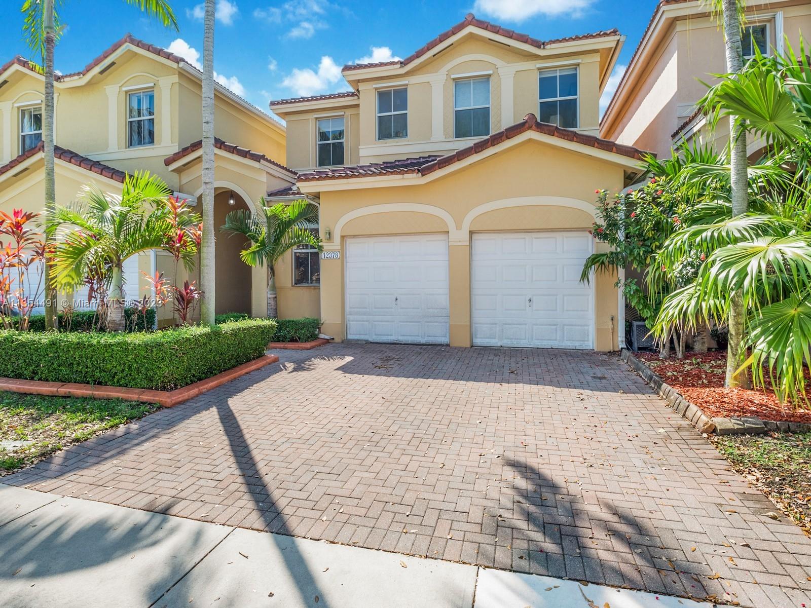 Photo 1 of 17 of 12378 SW 124th Ter townhome