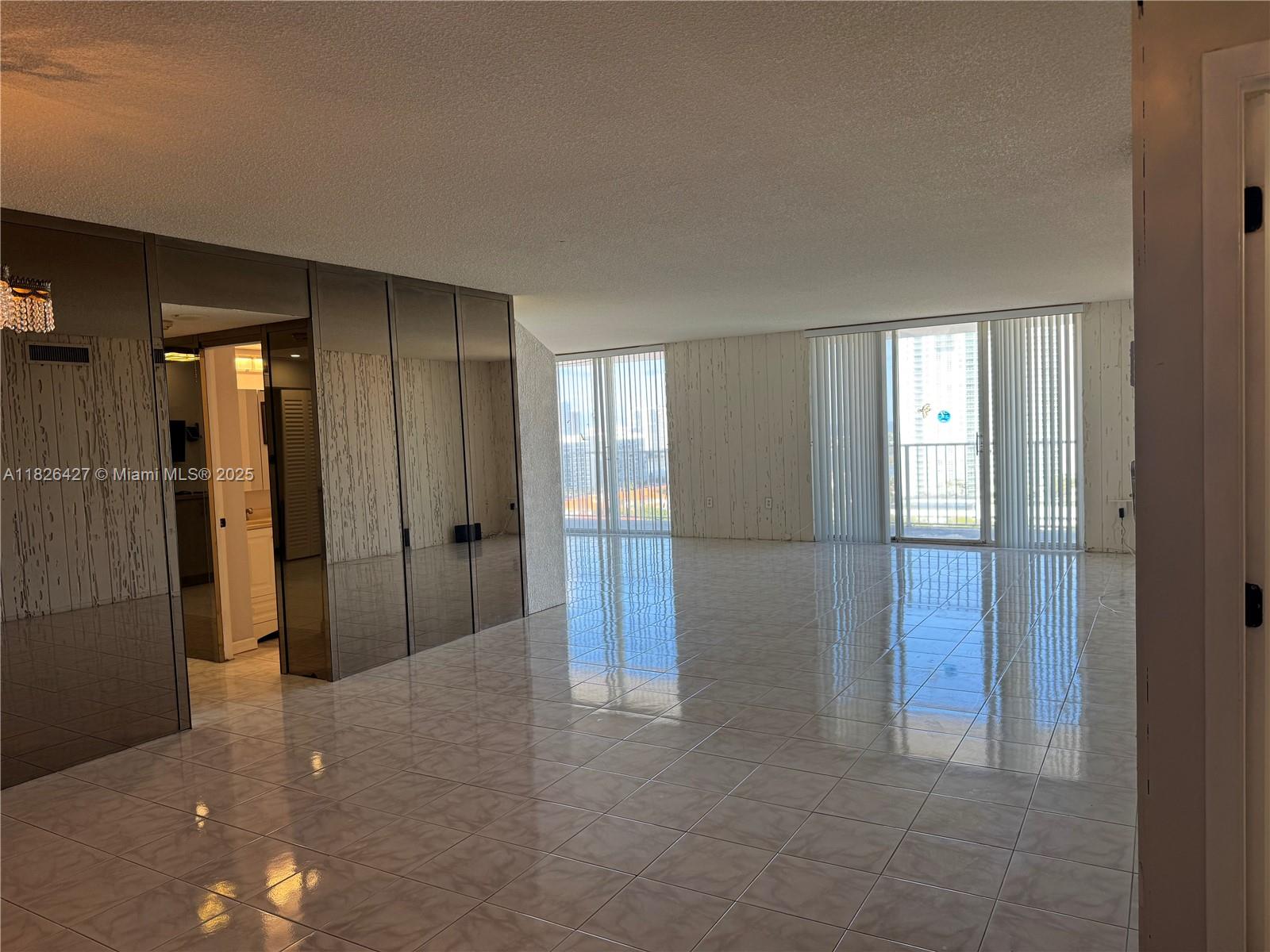 This spacious unit at 2132 Sq. Ft. is the largest in the building. Currently, it features a 2-bedroom +
2 1/2 bathrooms suite with a den that can be easily converted into a third bedroom. This unit is the only one in the building with a washer/dryer hookup, providing convenience for residents. Additionally, it includes ample storage space and 2 parking spaces right in front of the building’s entrance.
The building boasts two heated pools, tennis courts, and an updated gym. It’s conveniently located near Aventura Mall, Brightline, and a short drive to the beach.
The building offers a wide range of amenities, including two swimming pools, a sauna, basketball courts, tennis courts, a putting green, a courtyard, a BBQ area, a library, a business center, a billiard room