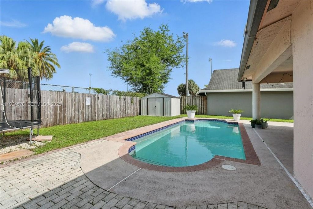 Photo of 5874 SW 97th Ter, Cooper City, FL 33328 (MLS # A11924576)