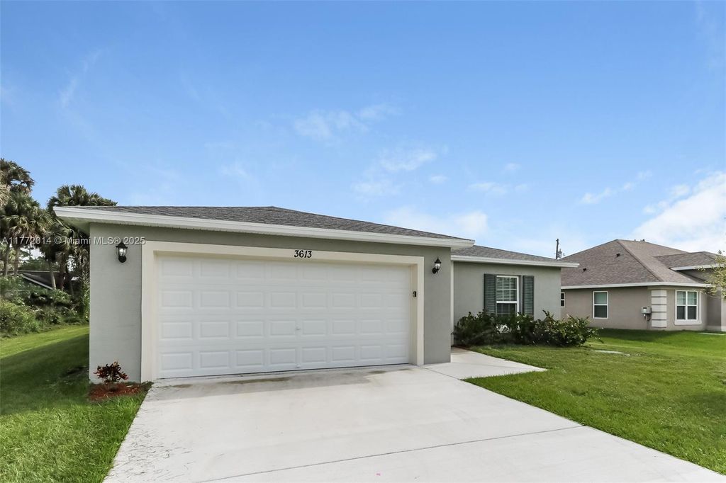 Photo of 3613 SW Ballweg St, Port Saint Lucie, FL 34953 (MLS # A11772014)