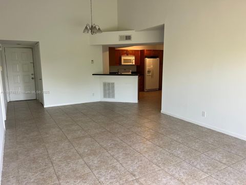 Photo of 8821 Wiles Rd #306, Coral Springs, FL 33067 (MLS # A11887821)