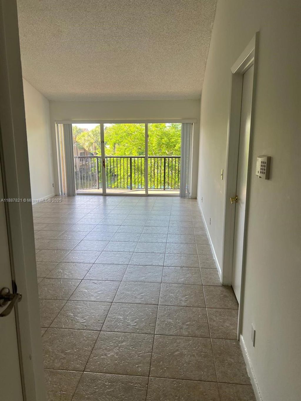 Photo of 8821 Wiles Rd #306, Coral Springs, FL 33067 (MLS # A11887821)