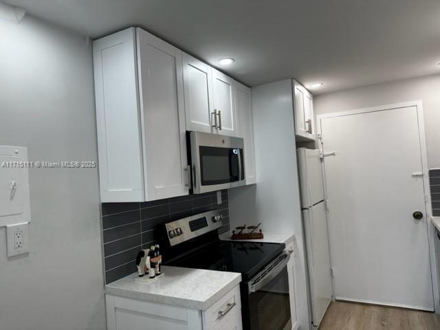THE CARRIAGE HOUSE CONDO - Residential