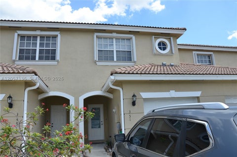 Photo of 351 SW 121st Ave, Pembroke Pines, FL 33025 (MLS # A12057136)
