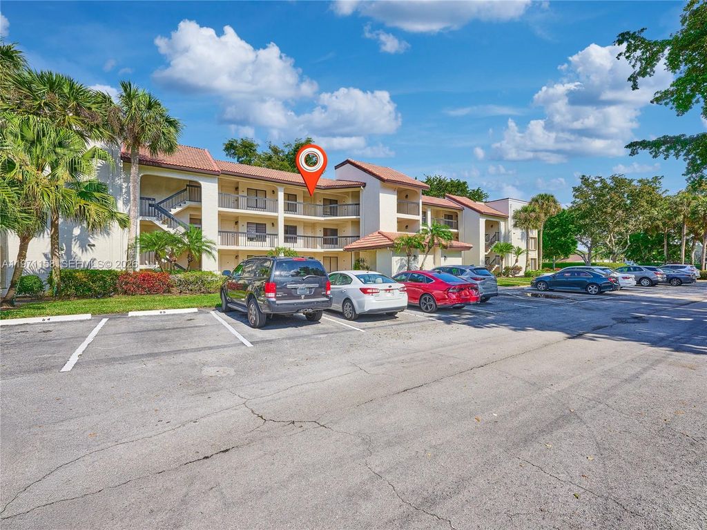 Photo of 10143 Mangrove Dr #303, Boynton Beach, FL 33437 (MLS # A11971158)