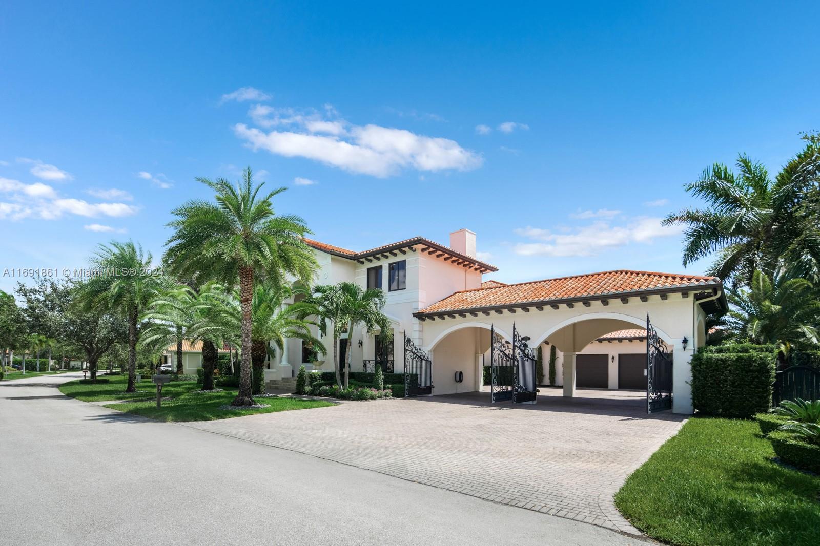 This exquisite 6-bedroom, 5-bathroom property offers breathtaking lake views and an abundance of space for both relaxation and entertainment.
As you step inside, Gorgeous marble and hardwood floors that create a seamless flow from room to room. The open-concept layout is perfect for modern living, allowing for effortless gatherings with family and friends.
The heart of the home is the gourmet kitchen, equipped with top-of-the-line appliances and stunning cabinetry, making it a chef's paradise.
The custom outdoor kitchen is ideal for summer barbecues, while the resort-style saltwater pool invites you to unwind and soak up the sun. Surrounded by lush landscaping, this space is perfect for entertaining or simply enjoying a peaceful afternoon by the water.