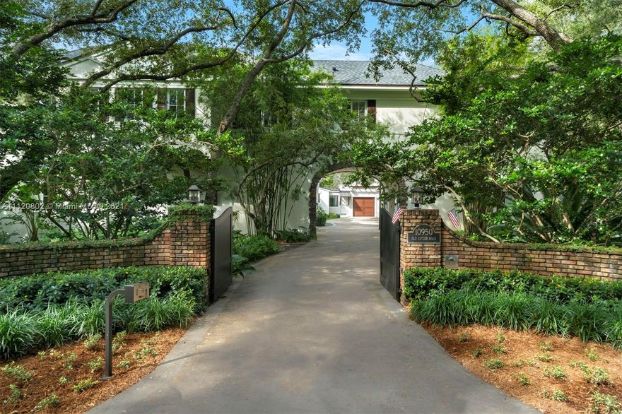 Extraordinary 13,849 Sq. Ft. residence in the coveted and guard-gated Snapper Creek Lakes community, with 8 bedrooms, 6 full and 2 half baths, Brazilian cherry wood floors and elegant finishes. Includes a theater, billiard room, bar, wine cellar, gym and 4-car garage. The formal dining and living rooms are perfect for entertaining, and the chef’s kitchen has top-of-the-line appliances, marble countertops and breakfast area. The stunning library has a fireplace and circular staircase leading to the second level. The main suite has a private terrace and jacuzzi, spa-like bath with dual vanities, frameless shower and bathtub. Nestled on 1.14 acres of gorgeous grounds, with an infinity pool, adjacent lounge area, summer kitchen, gazebo and homeowner's rights at the Snapper Creek Marina.