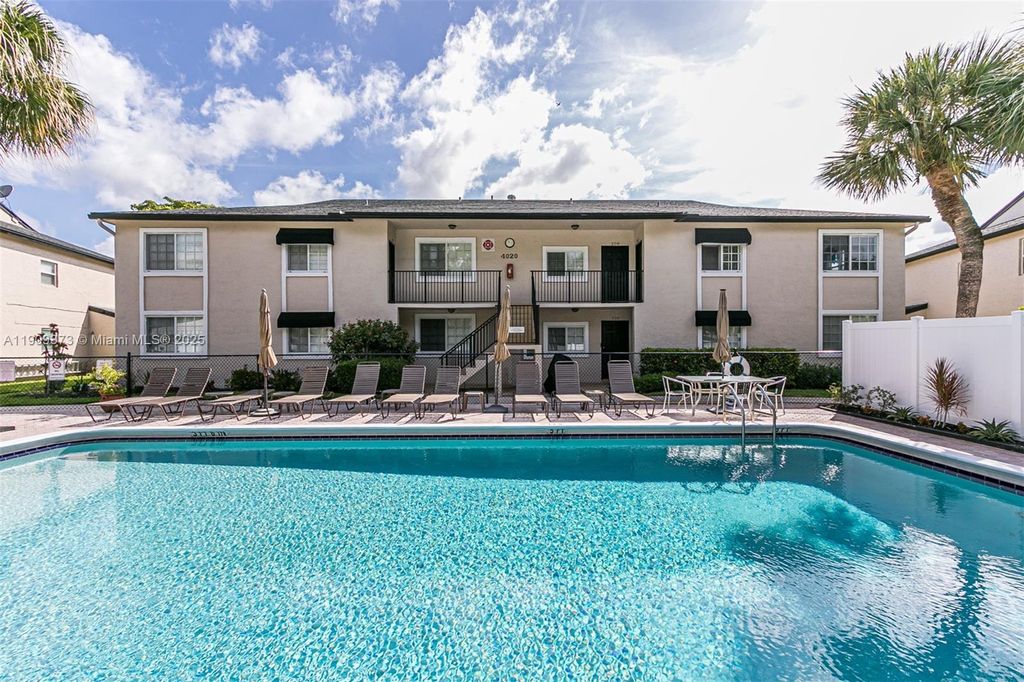 Photo of 4020 Crystal Lake Dr #209, Deerfield Beach, FL 33064 (MLS # A11909373)