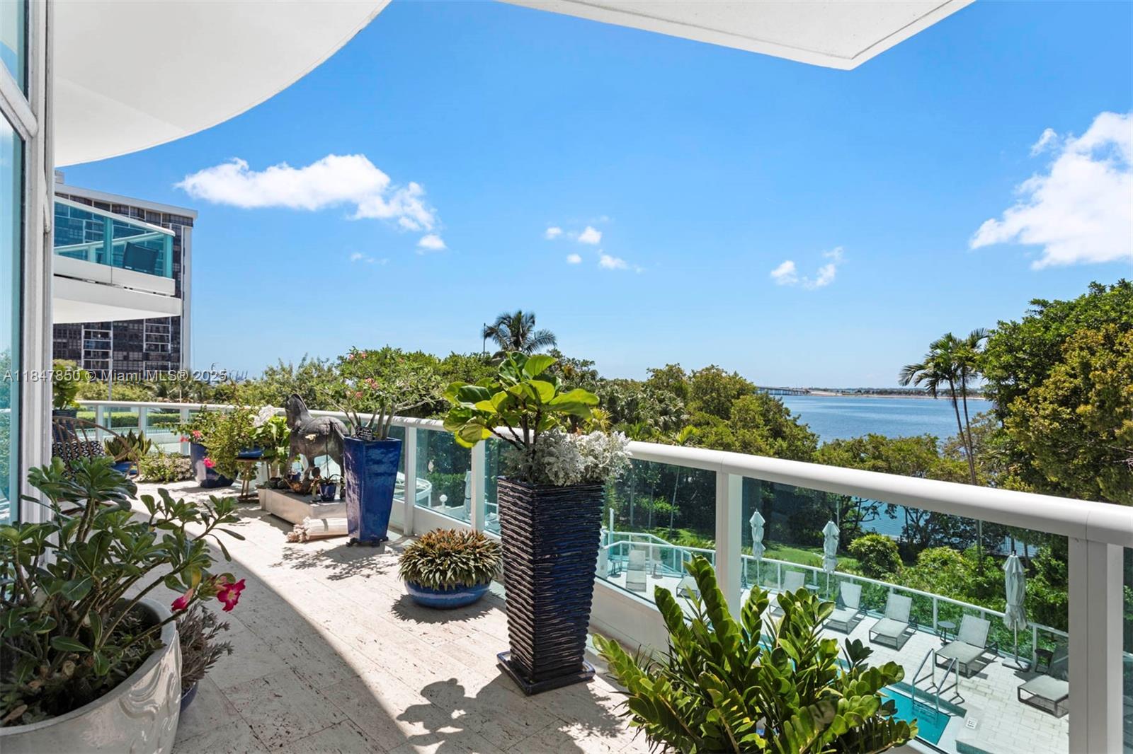 Remodeled two-story residence at the exclusive Bristol Tower in Brickell. This 3 bed / 3.5 bath home offers breathtaking panoramic views of Biscayne Bay from every room. Designed for luxury living, it features a spacious terrace ideal for entertaining, a sleek modern kitchen with Samsung appliances, Allini water filtration system, and stone countertops, and expansive living/dining areas with large-format porcelain floors. The primary suite boasts a private terrace, dual walk-in closets, and separate dual bathrooms. Additional bedrooms include en-suite baths and terrace access, plus a versatile den/office. Feels like a private home with all the benefits of a full-service building: waterfront pool, fitness center, tennis court, valet, 24/7 security, and on-site convenience store.