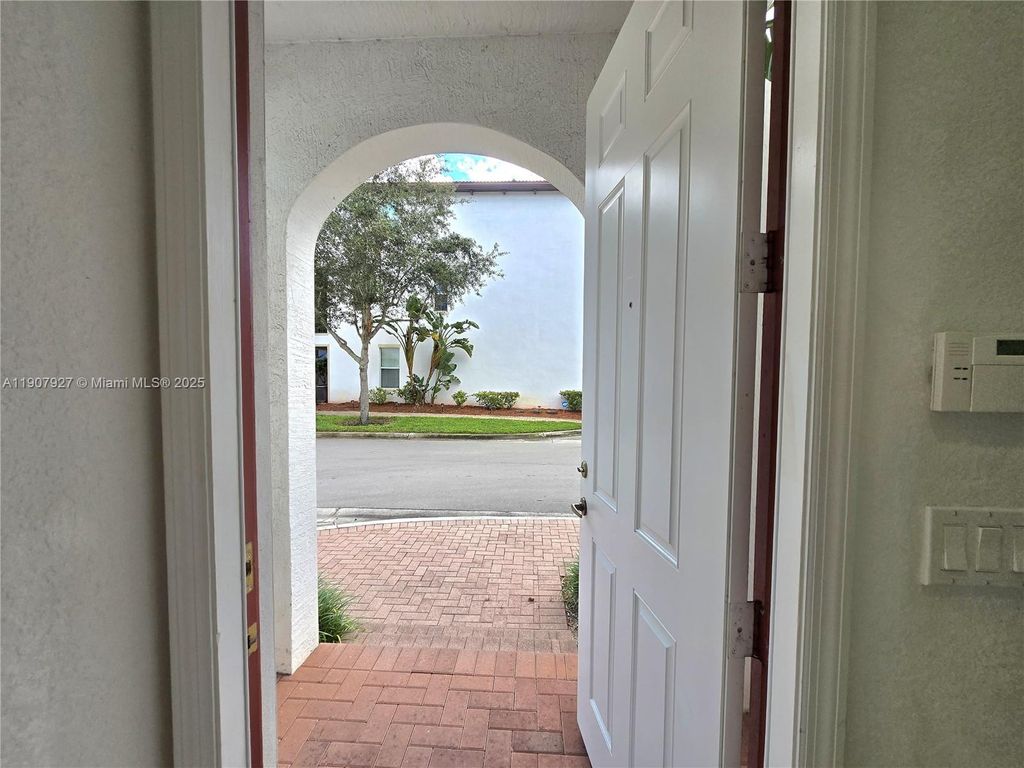 Photo of 11938 SW 26th Ct, Miramar, FL 33025 (MLS # A11907927)