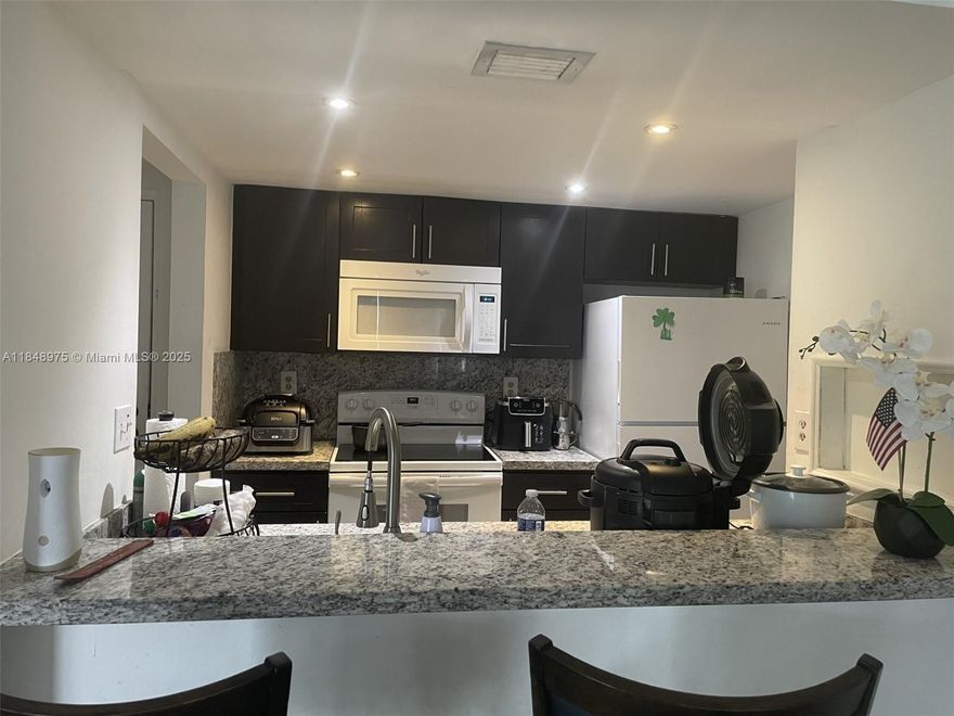 Beautifully remodeled two-bedroom, two-bathroom unit that presents an excellent investment opportunity. Currently leased with eight months remaining on the lease, this property ensures immediate cash flow for savvy investors. The modern design features an open-concept living space, flooded with natural light, and a stylish kitchen equipped with updated appliances and sleek finishes. Each bedroom offers ample space and comfort, complemented by well-appointed bathrooms that enhance the overall appeal. Located in a vibrant community with convenient access to shopping, dining, and entertainment, this unit not only promises a lucrative return but also a desirable lifestyle for future tenants. Don't miss out on this fantastic investment opportunity!