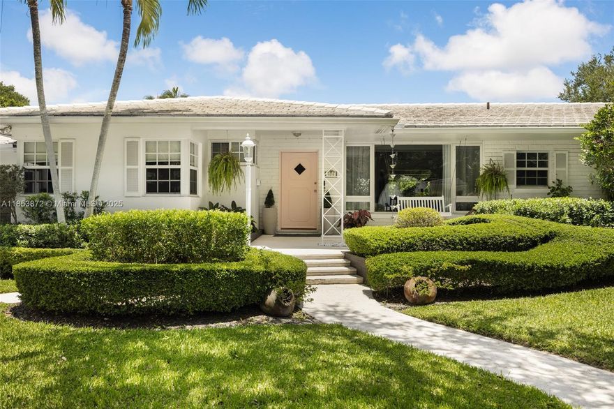 Timeless Charm Meets Future Potential in Central Miami Shores. 
First time on the market in nearly 30 years! This sunlit 4BD/3BA 1951 ranch sits on a rarely available 18,730 SF oversized corner lot in central Miami Shores just one block from the rec fields and minutes to Miami Country Day and Cushman. Offering soul, scale, and setting, the 2,589 SF home (3,078 SF total) features gracious living areas, a renovated primary bath and built-in closets, impact windows, Tesla EV charger, solar panels, and 2-car garage. A rare and unique opportunity- livable as-is or for those envisioning a personalized expansion with a pool and more, this one delivers.