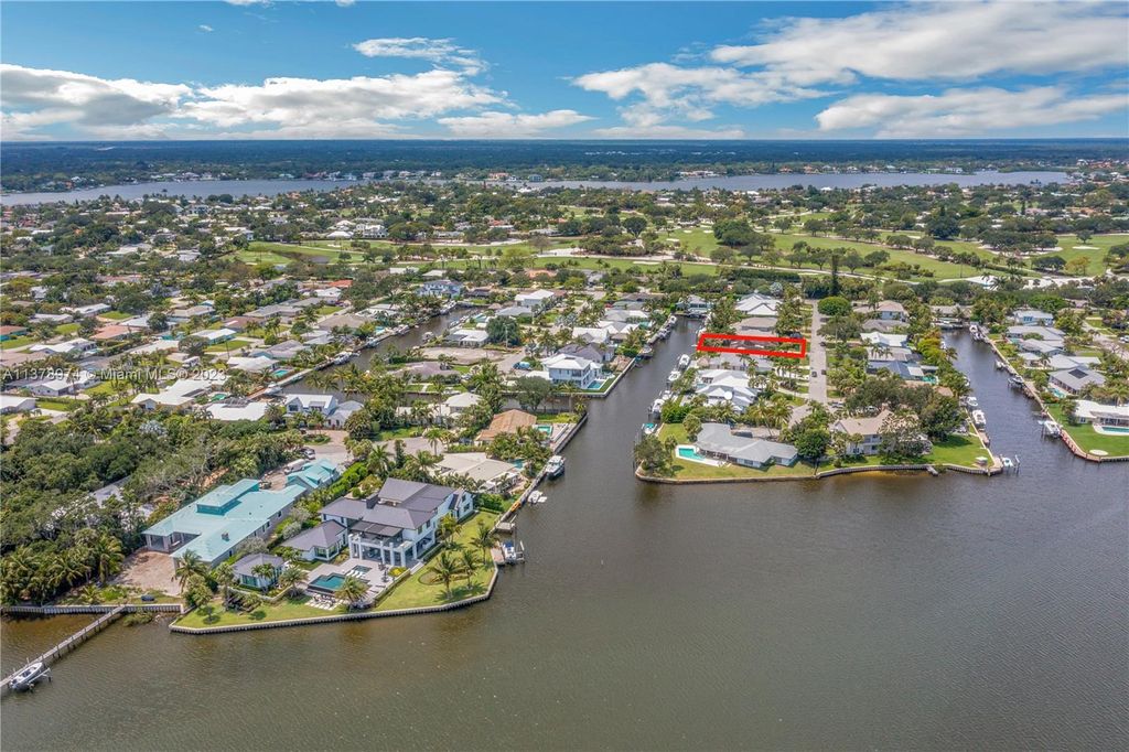 Photo of 20 Tradewinds Cir, Tequesta, FL 33469 (MLS # A11378974)