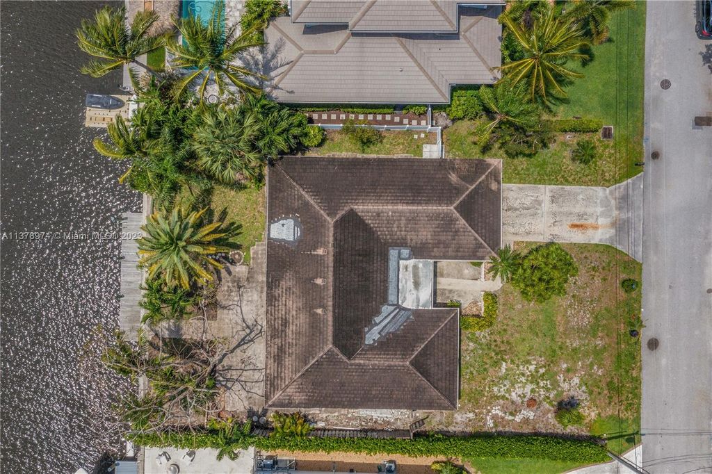 Photo of 20 Tradewinds Cir, Tequesta, FL 33469 (MLS # A11378974)