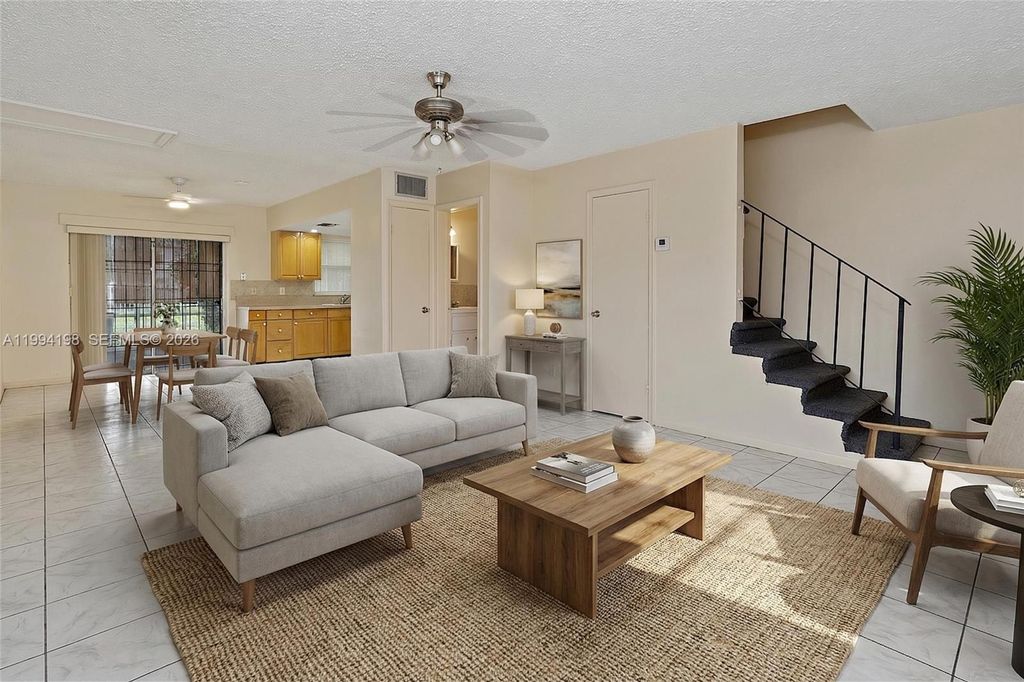 Photo of 5415 NW 27th St #A1, Lauderhill, FL 33313 (MLS # A11994198)