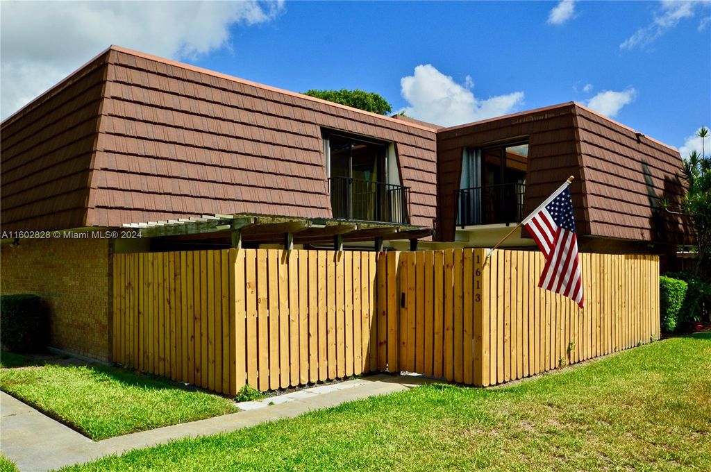 Photo of 1613 16th Ln, Palm Beach Gardens, FL 33418 (MLS # A11602828)