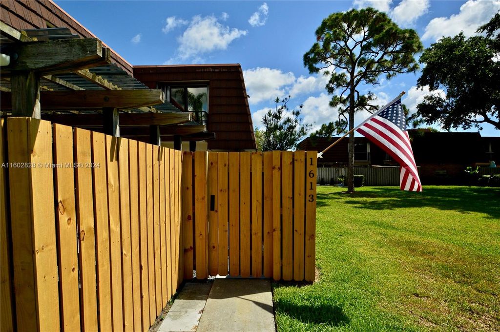 Photo of 1613 16th Ln, Palm Beach Gardens, FL 33418 (MLS # A11602828)