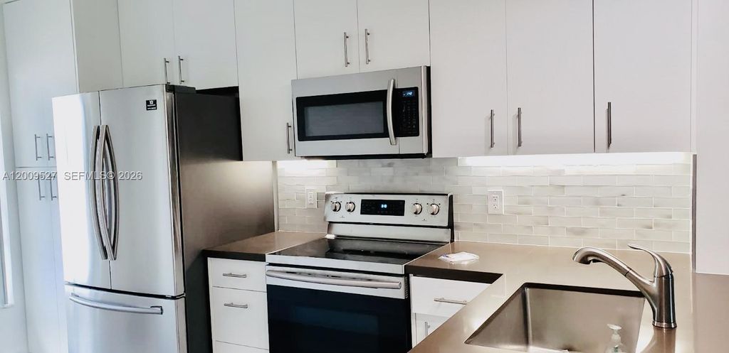 Photo of 16691 Hemingway Dr #16691, Weston, FL 33326 (MLS # A12009527)