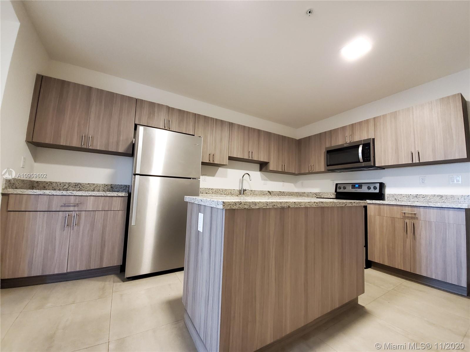 Move-in Special! First Month and One Month Security Deposit to Move for well-qualified Tenants! No Association. Fast Approval! Luxury Boutique Building! New (2019) development located off of 60th Ave and Flagler Street. This spacious 2 bedroom unit features new impact windows and doors, central A/C, modern kitchen cabinets with granite counter tops, stainless steel appliances, washer and dryer in unit, beautiful bathrooms, LED lighting, one assigned parking space. Easy to show. Will not last!!