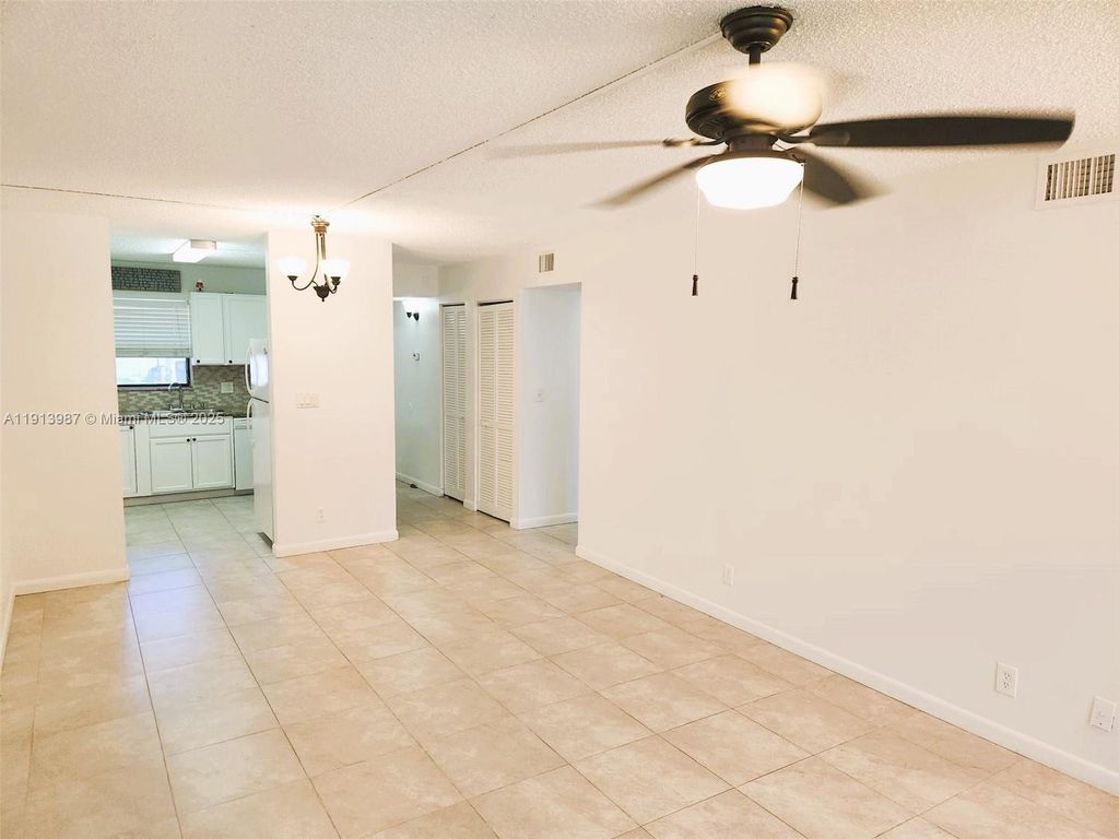 Photo of 11453 NW 39th Ct #111-2, Coral Springs, FL 33065 (MLS # A11913987)