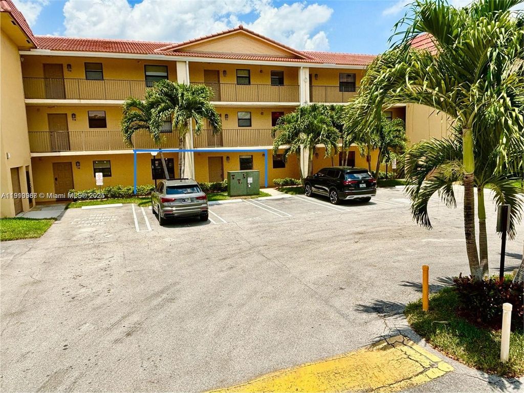 Photo of 11453 NW 39th Ct #111-2, Coral Springs, FL 33065 (MLS # A11913987)