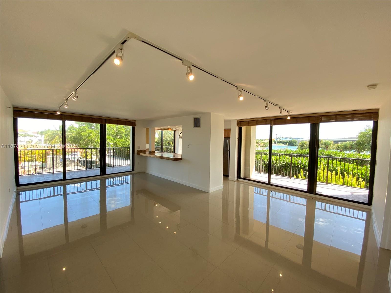 RARELY AVAILABLE! THIS SPACIOUS 2-BEDROOM, 2.5-BATH CORNER RESIDENCE BOASTS A DESIRABLE SPLIT FLOOR PLAN AND OVER 1,400 SQ. FT. OF UPDATED LIVING SPACE. ENJOY BREATHTAKING VIEWS OF DOWNTOWN MIAMI AND BISCAYNE BAY FROM THE EXPANSIVE WRAP-AROUND BALCONY—PERFECT FOR UNWINDING WITH STUNNING SUNSETS. THE ISLAND’S BEAUTIFULLY MAINTAINED COMMON AREAS ALSO OFFER SPECTACULAR WATER AND SKYLINE VIEWS, MAKING EVERY STROLL OR OUTDOOR MOMENT A SCENIC EXPERIENCE. RESORT-STYLE AMENITIES INCLUDE A BRAND-NEW CLUBROOM, POOL, TENNIS COURT, 24-HOUR SECURITY, AND GUEST PARKING. BRAND NEW REC ROOM. HALLWAYS AND LOBBY WILL BE FULLY REMODELED BY DECEMBER 2025 (CHECK RENDERING PICTURES). 40-YEAR RECERTIFICATION COMPLETED. RENTED UNTIL 10/31/25. SHOWINGS WITH 24-HOUR NOTICE. THANK YOU!