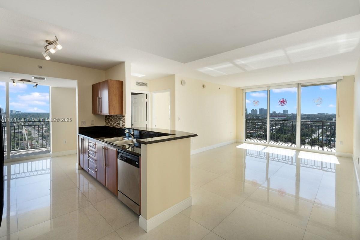 SPACIOUS 3 bed 3 full bath! One Parking space included and additional spaces available for rent. All rooms are spacious. Corner Unit with beautiful coconut grove BAY views and city skyline views. Unit Features porcelain floors through-out, NEW Stainless Steel Appliances and Granite Counter Tops, NEW A/C unit and Wash & Dryer both were recently installed. Unit was painted white. Water, Cable and Internet is included in the owner's maintenance fees. Excellent location close to Downtown Coral Gables , coconut grove, beaches and downtown miami. Amenities included: POOL, GYM, CONFERENCE MEETING ROOM, CLUBHOUSE, SAUNA & FRONT DESK CONCIERGE.