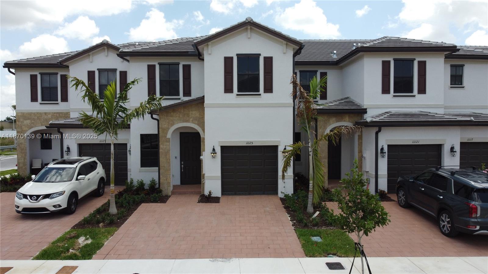 A stunning townhouse located in the Aquabella Community. The property features 4 bedrooms, 2.5 baths, a beautifully designed open kitchen that flows into the dining room, a one-car garage, an oversized driveway with ample space for two additional cars, and a charming backyard. This home boasts exquisite finishes, and its prime location offers convenient access to major highways such as the Turnpike, Palmetto, and I-75, as well as supermarkets, gas stations, shopping centers, Walmart, and more. Don’t miss the opportunity to make this your dream home!