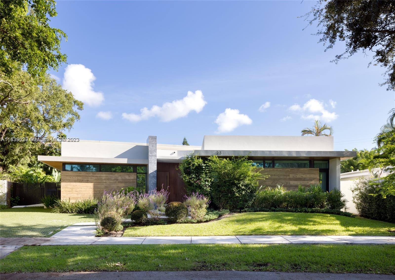 Located in the private Bay Heights community of Coconut Grove steps from Vizcaya, Alice Wainwright Park, and minutes to downtown Miami & South Beach this AIA Award home featured in House and Garden as a master class of indoor-outdoor living evokes mid-century modernism across its sprawling 4,512 square foot open floor plan. Featuring a custom open kitchen with appliances by Sub-Zero & Wolf and a sun soaked indoor atrium. Elegant terrazzo flooring throughout leads to entertaining spaces and a large, covered pool patio. The 4 bedroom ensuites provide luxurious tile and fixtures and the master opens directly to the pool. Additional amenities include a media room, 2-car garage with electric vehicle charging, generator, pool and spa. Bay Heights Community provides 24/7 police patrol security.