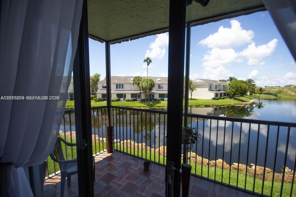 Photo of 16561 Blatt Blvd #201, Weston, FL 33326 (MLS # A12015033)