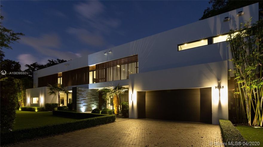 Tucked away Ponce-Davis modern oasis embodies visionary 21st-century Miami design & timeless luxury. Custom details define this 1st-time-on-market Mocca masterpiece. Architectural symmetry & understated sophistication set the stage for flowing wood-floored interiors. Lofty glass walls provide ethereal sunlight & invite serene tropical & pool vistas. Wolf Kitchen opens to gorgeous Great Room distinguished by Living, Dining & Family areas. Dazzling exhibition Garage flanks must-see Man Cave. Glass-walled sleeping quarters, comprised of exquisite Master & stylish en suite Bdrms, is an ultra-luxe treehouse-like sanctuary. Chic window treatments & mature landscaping ensure privacy.Lavish sundecks & covered/retractable summer kitchen/lounge dial up SoFla Living quotient.A sensational residence!