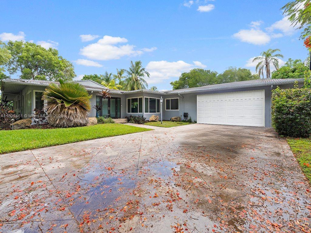 Located in prestigious PINECREST, this light-filled 5-bedroom, 4-bath home plus spacious den (easily a 6th bedroom) sits on a large lot with a pool. Enjoy peace of mind with all impact windows and doors with a lifetime warranty. Home Features include tile flooring, a stunning kitchen with Sub-Zero fridge, a generous butler's pantry and generator ready. Zoned for top-rated public schools comparable to private education. Sellers offer several creative financing options, including a wrap mortgage at 4%. Contact the listing agent for details. Great property with many possibilities. 24-hour notice required by appointment only!!