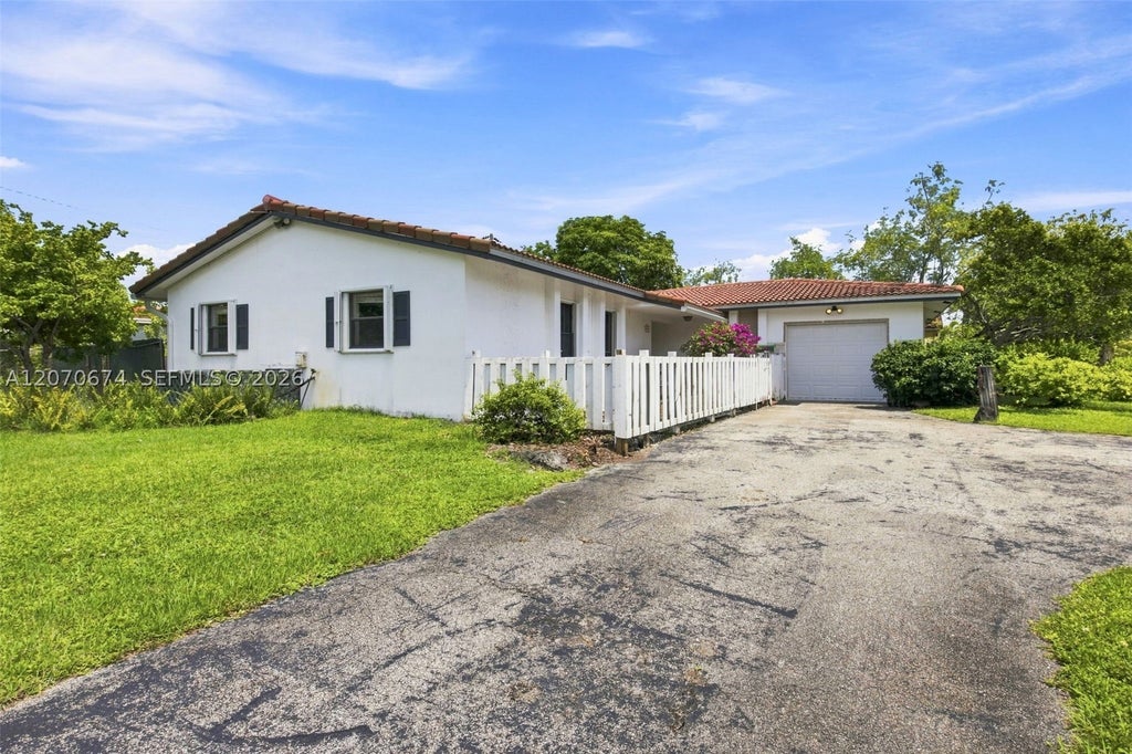 Photo of 4121 NW 78th Way, Coral Springs, FL 33065 (MLS # A12070674)