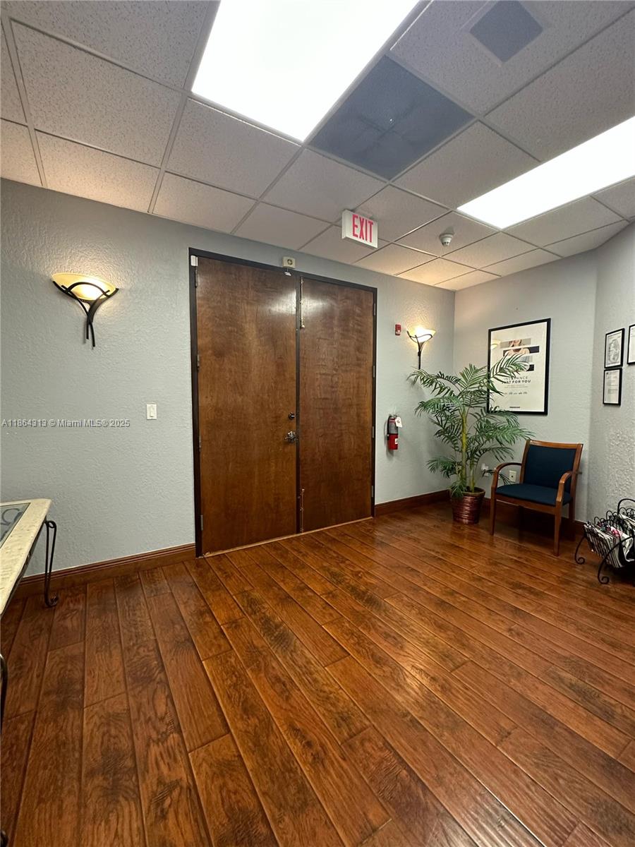 Ideal for professional offices, creative agencies, studios, or mixed-use businesses. Floorplan features six private offices with French doors, a large open workspace, a reception area, a file/storage room, a large kitchen and an ADA-compliant bathrooms. Equipped with impact-resistant windows, a balcony, and a security alarm system.
Includes four assigned parking spaces for convenient on-site access.