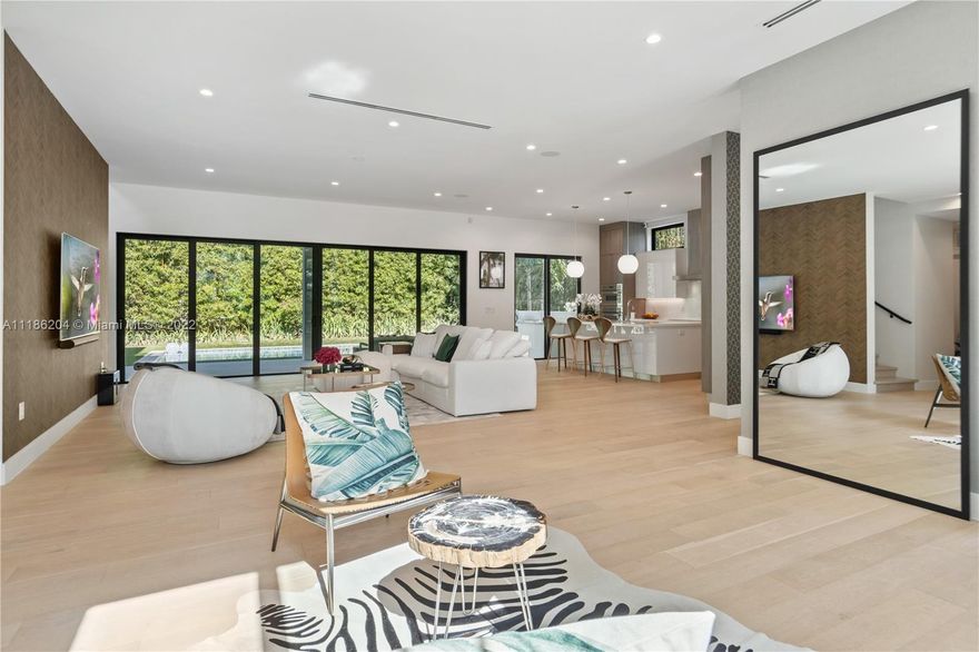 This beautiful new construction was built in 2020, offering 5 bedrooms, and 3,859 SF of living area. The 2- story home provides for an open floor plan and lots of natural light. Additional features are wood floors, a modern open kitchen with kitchen island, modern bathrooms, spacious his-and-hers walk-in closets and a large terrace on the first floor overlooking the pool. The 10,000 Sf lot offers a covered terrace with summer kitchen, a pool and lost of privacy because of its lush vegetation. The property offers a 1-car garage and a carport.