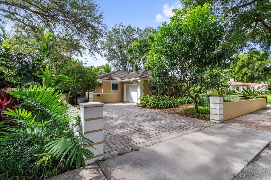 Impeccably maintained, beautifully renovated and fully turnkey 3BR/2BA home nestled on a serene, tree-lined street near the iconic Biltmore Hotel. Elegant travertine floors flow throughout the bright, open layout featuring a welcoming foyer, large living room, and spacious chef-inspired kitchen with custom cabinetry, granite counters, and premium appliances.  The primary suite offers custom built-ins and a luxurious ensuite bath with custom vanity and stone tops.  Enjoy abundant natural light, full impact doors and windows, impact garage door, newer roof (2011), paver driveway, front courtyard, rear patio, and lush professional landscaping.