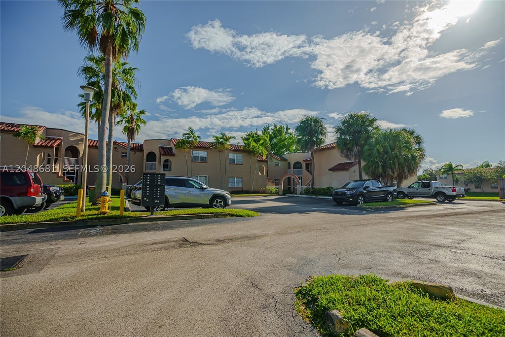 Photo of 8630 SW 3rd St #102, Pembroke Pines, FL 33025 (MLS # A12048681)