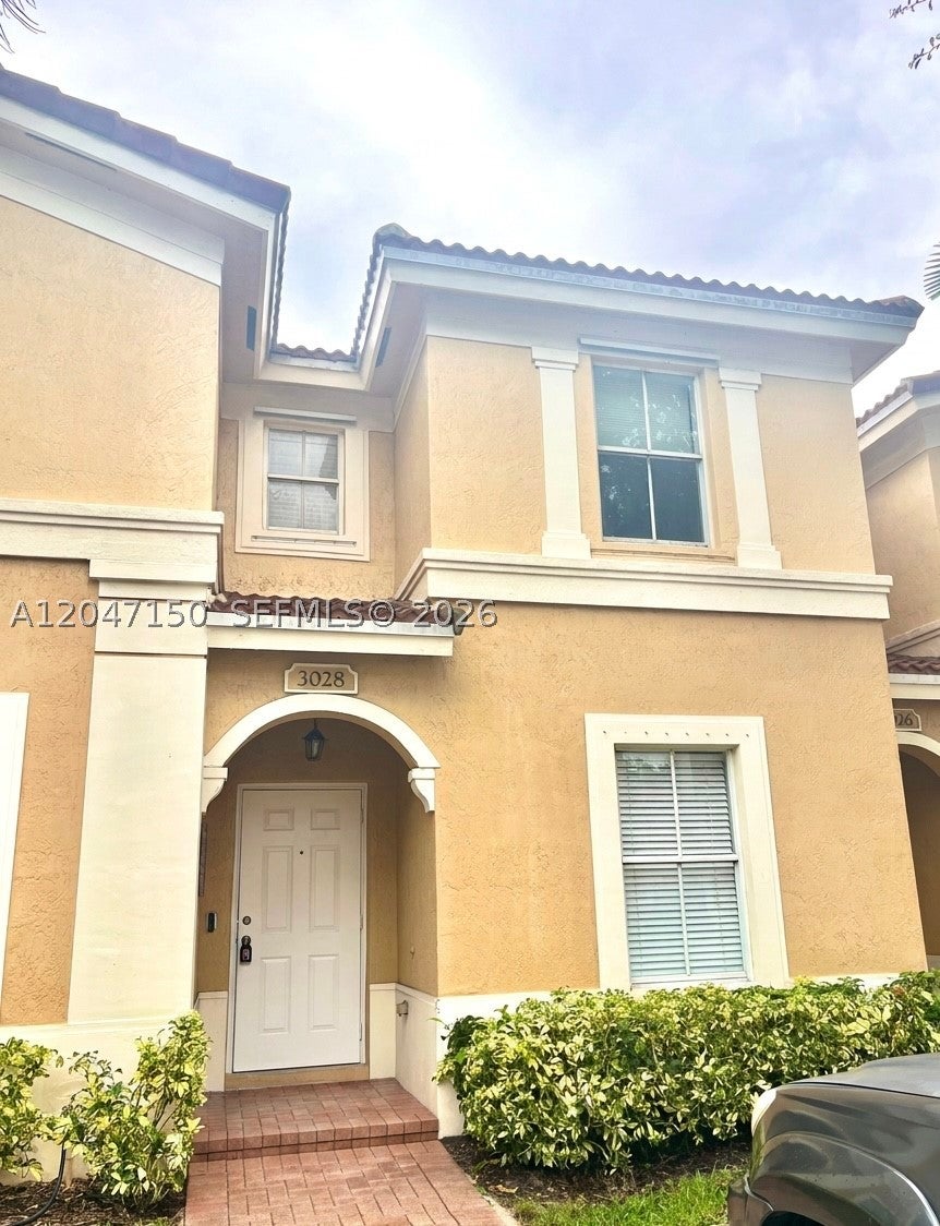 Photo of 3028 SW 129th Ter #120, Miramar, FL 33027 (MLS # A12047150)