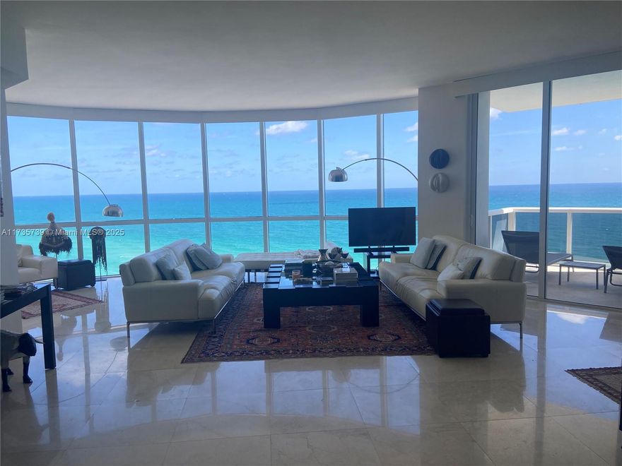 Remarkable 180-degree ocean view with the horizon exactly at eye level as you enter the unit from the private elevator, because the 16th floor is not too high where you only see the sky, nor too low where you see too much of the street/beach and hear too much noise.
You go down from the gym just three flights of stairs.