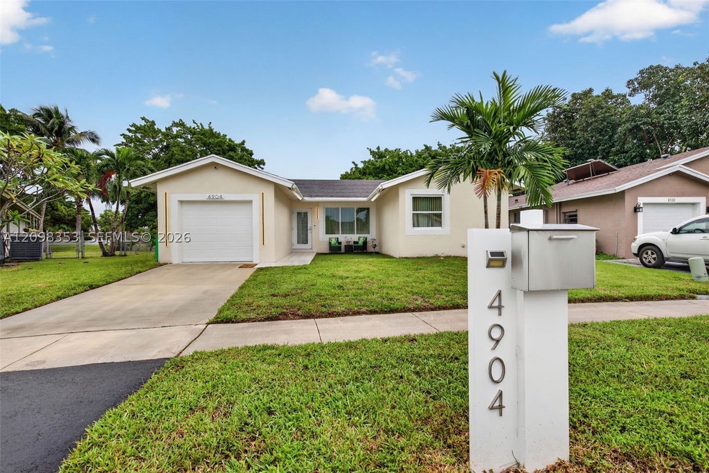 Photo of 4904 NW 96th Ave, Sunrise, FL 33351 (MLS # A12098353)