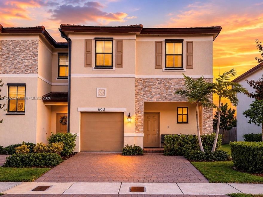 Built in 2022 within Enclave South Phase 2, this corner-unit 3-bedroom, 2.5-bath townhouse offers approximately 1,832 Sq.Ft. of living area on a 1,773 Sq.Ft. lot. The two-story layout includes open living and dining areas, kitchen with adjacent family room area, and a single car garage. The property features a fenced patio area and driveway parking. Located near Black Creek Trail, shopping, dining, schools, and access to major roadways including the Florida Turnpike.