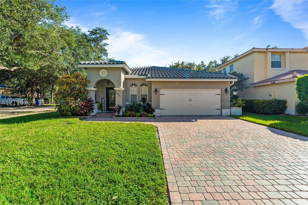Photo of 4402 NW 43rd St, Coconut Creek, FL 33073 (MLS # A12110769)