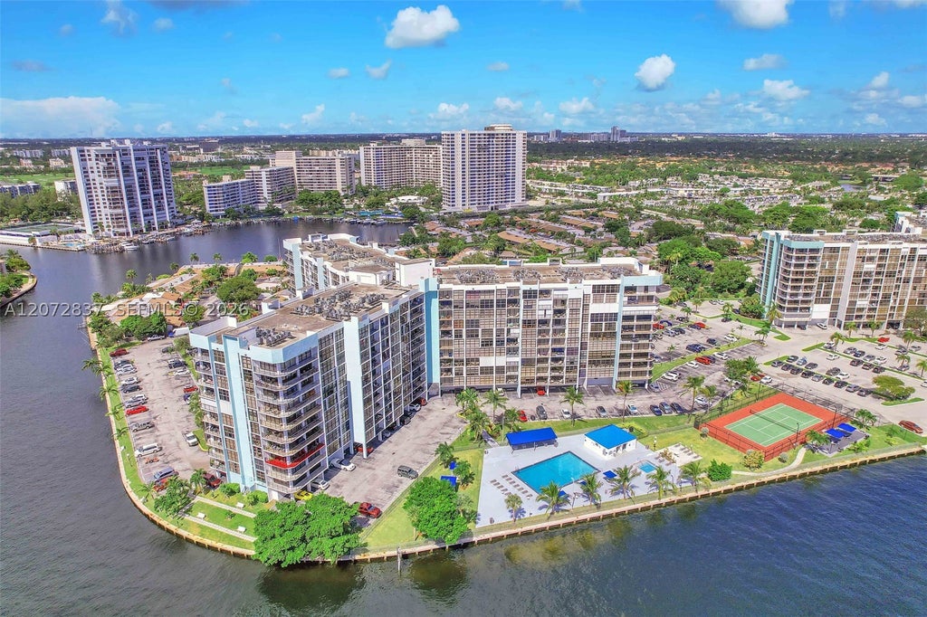 Photo of 200 Leslie Dr #818, Hallandale Beach, FL 33009 (MLS # A12072837)