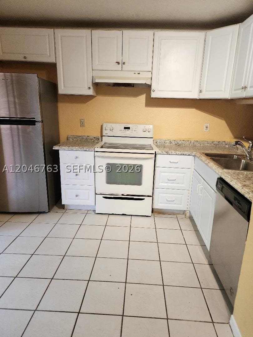 Photo of 4147 NW 19th St #4147, Lauderhill, FL 33313 (MLS # A12046763)