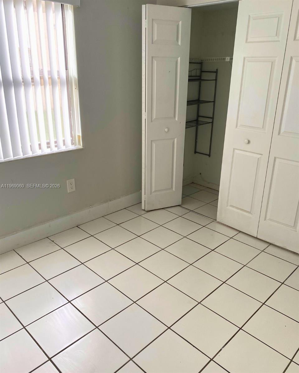 WEST GARDENS VILLAGE COND - Residential Lease