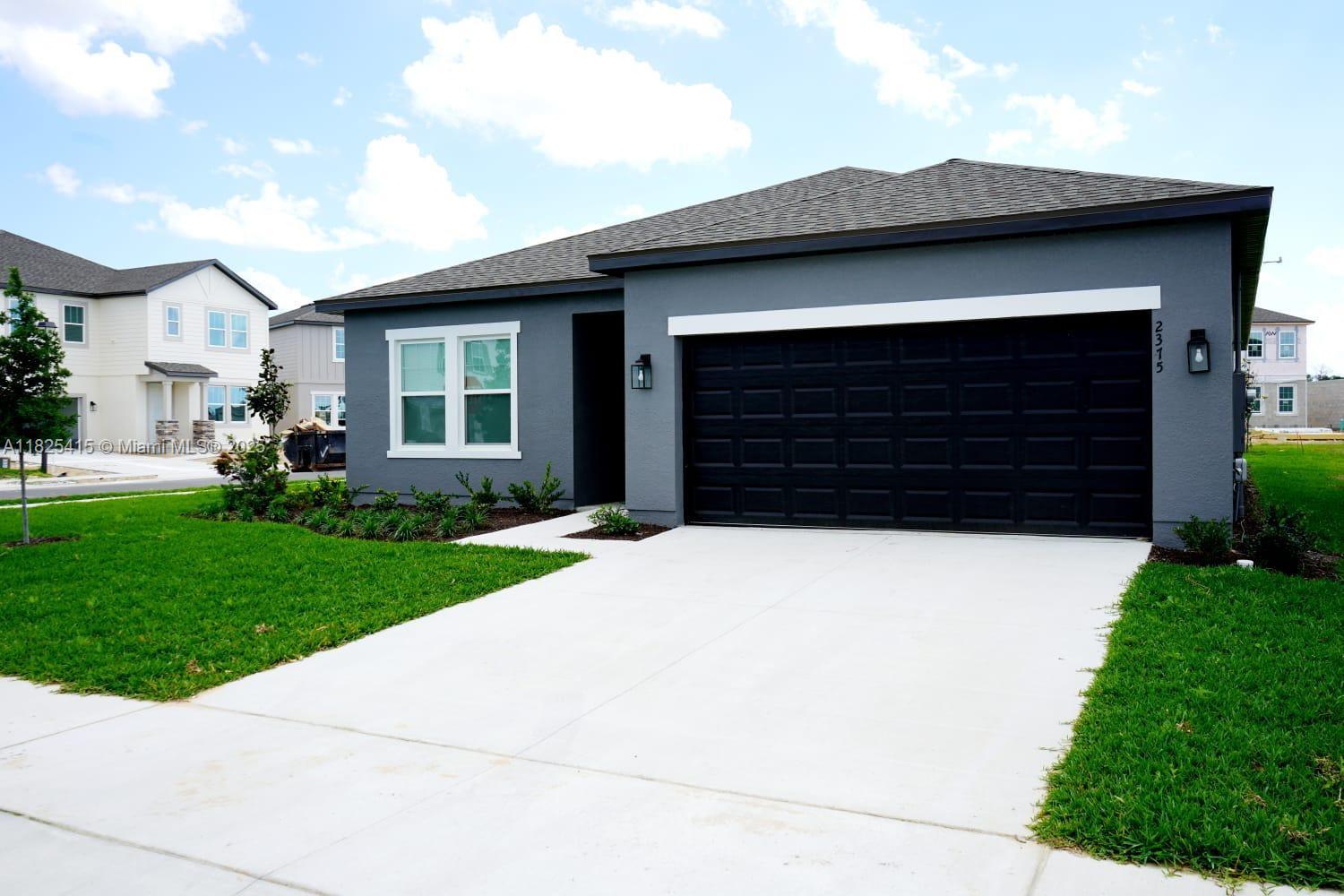 Experience resort-style living in Champions Gate with this beautifully upgraded 4-bedroom, 2-bathroom home. Situated on an oversized corner lot, this 1,910 sq. ft. residence features a spacious open floor plan and fresh interior paint throughout. Interior highlights include high-quality plank ceramic tile, quartz countertops in the kitchen and bathrooms, 42” cabinets, sleek stainless steel appliances, and soaring ceilings. Enjoy access to exceptional resort-style amenities and take advantage of flexible zoning options for short-term rental, long-term rental, or primary residence. This property presents an outstanding opportunity for both investors and discerning buyers. Schedule your private tour today.