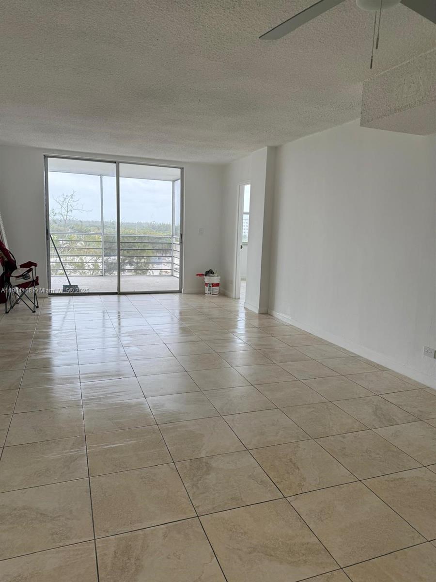 Great 1 bedroom/1.5 bathrooms condo, approximately 865 sq. ft. tile floors, located in the prestigious police guarded community of Eastern Shores. The unit features a, stainless steel refrigerator, microwave and range, large walk-in closet, spacious screened balcony, pet friendly building, all ages, assigned parking, clubhouse, pool overlooking the beautiful canal view. No fixed bridges enjoy your way to Haulover sandbar year-round sunny weather. Conveniently located just steps from pristine beaches, world-class dining, houses of worship, shopping, and entertainment options, this exceptional property offers the ultimate coastal lifestyle.