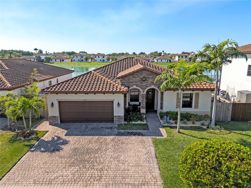 This meticulously maintained, lakefront property offers breathtaking views and luxurious living. With 4 spacious bedrooms and 3 beautifully appointed bathrooms, this home is perfect for family living and entertaining. One of the bedrooms and bathrooms is privately situated on the opposite side of the house, making it ideal for guests, older kids, offices, or older parents seeking extra privacy. The master suite features a private view of the lake and a massive walk-in closet for added convenience and comfort. Step outside to a large terrace, complete with electricity, perfect for outdoor gatherings while enjoying serene lake views. The generous yard is fully fenced, providing privacy and ample space for children or pets to play. Don’t miss the opportunity to own this lakeside gem!