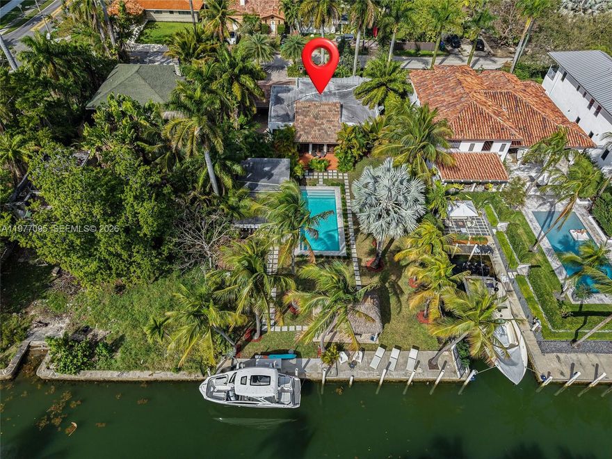 Located in the highly desirable Shorecrest / Davis Harbor neighborhood, this beautifully restored waterfront residence sits on an oversized 13,248 square foot lot with 72 Feet of Waterfront and No Fixed Bridges, offering easy Direct Access to Biscayne Bay. The property has 2,898 total square feet of living area according to the survey and appraisal. The main home features 3 bedrooms and 2 bathrooms with bright, open living spaces that blend classic architectural charm with modern comfort. A detached 1-bedroom, 1-bathroom guest house with a fully equipped kitchenette provides the perfect space to host visitors. Surrounded by lush landscaping and designed for both relaxing and entertaining, this property presents a rare opportunity to enjoy Private Waterfront Living in one of Miami’s most charming residential neighborhoods.