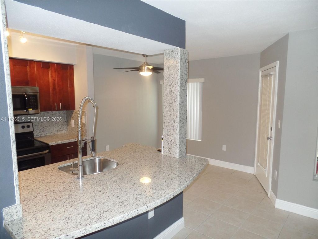 Photo of 2460 NW 33rd St #1704, Oakland Park, FL 33309 (MLS # A11936915)